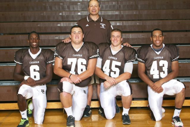 The 2014 Caravan was led by Coach Frank Lenti and team captains (left to right)Marquise Peggs, Troy Weissenhofer, Jack White, and Nick Wheeler.