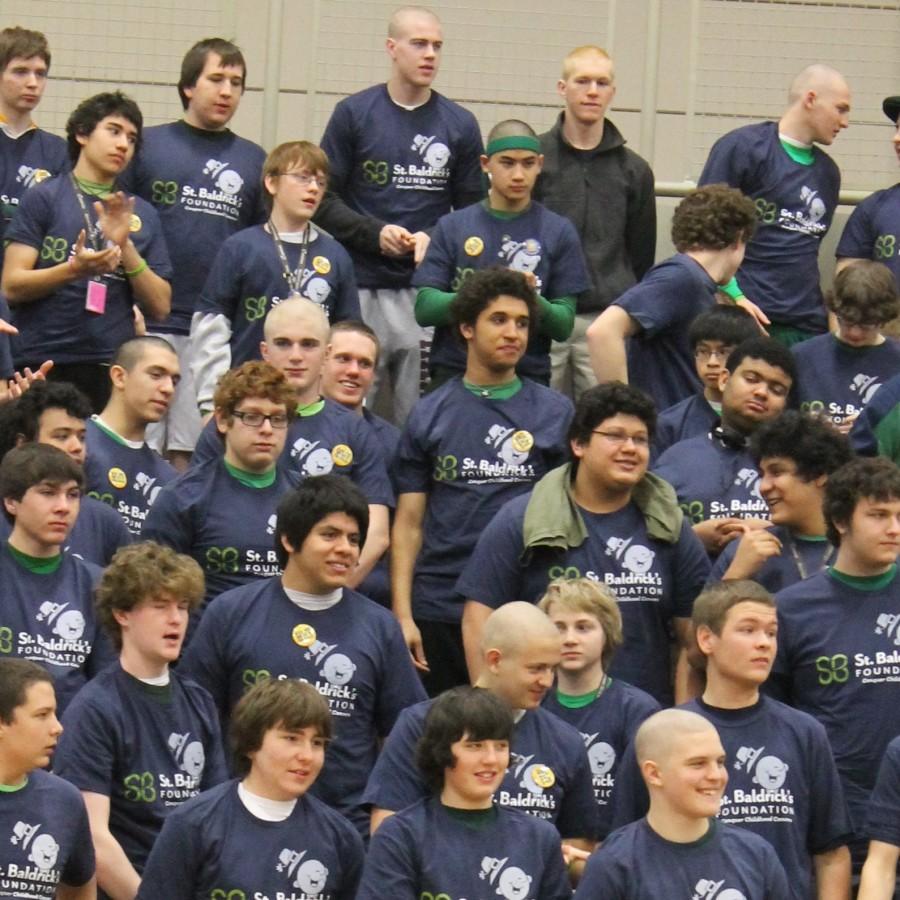 In+a+photo+from+last+years+event%2C+MC+students+wait+their+turn+to+have+their+heads+shaved+for+St.+Baldricks+Day.+