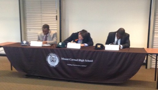 (Left to right) Jeremy Houston, Jake Tucker, and AJ Lewis sign their Division I National Letters of Intent.