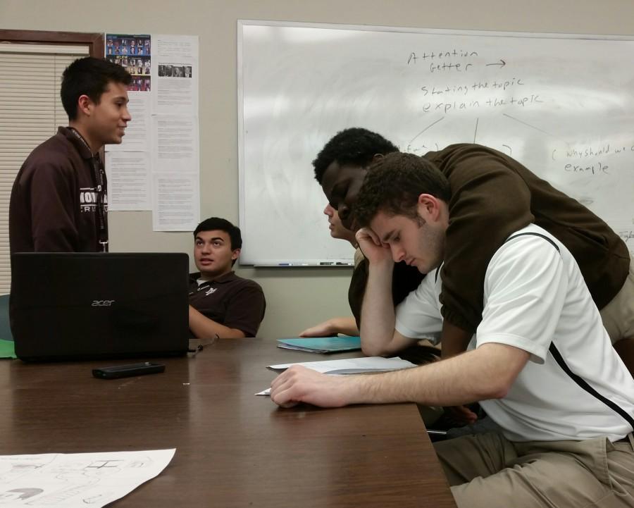 A few members of the Speech team studying their lines.