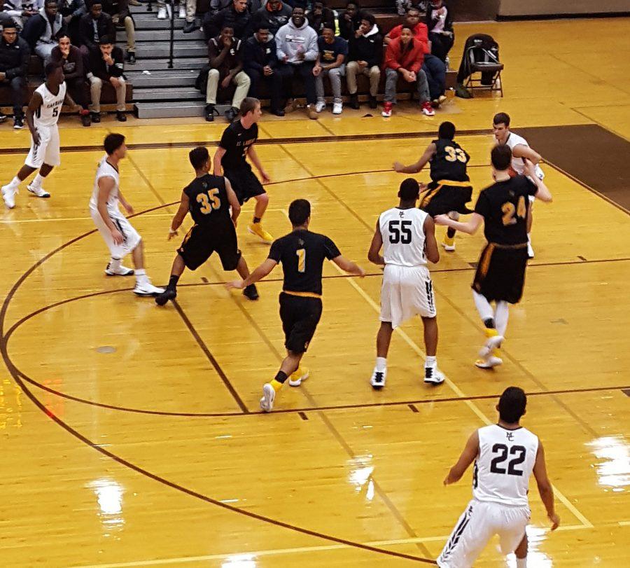 The Mount Carmel Varsity Basketball team won its first game of the year against St. Laurence on Friday night.