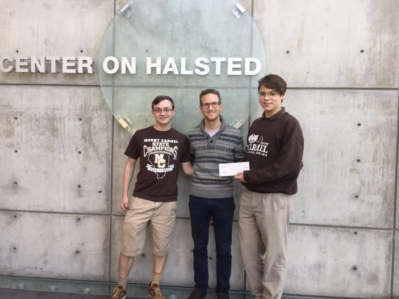 MCGSA cofounders Luke Ehrenstrom (left) and Patrick McKay donated $500  to Center on Halsted on May 25 on behalf of MCGSA.
