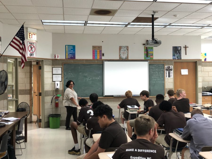 Mrs. Emma Norise, pictured in her 2019 Chemistry class, is the moderator of the Medical Enrichment Club.