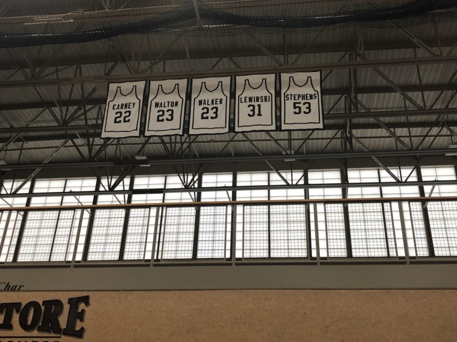 The five Mount Carmel basketball jerseys that hang in the Cacciatore Gym.  