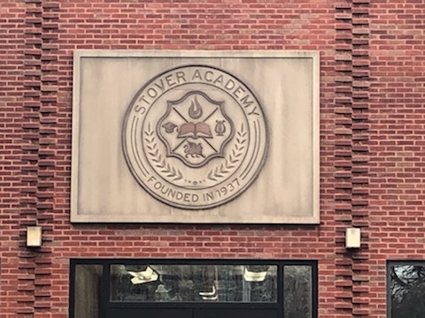 This week, the sign above the Prayer Garden door identifies our school as Stover Academy.