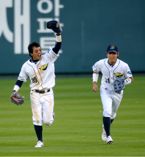 Two members of the reigning KBO champion Doosan Bears seem excited to be playing, even without fans. 
