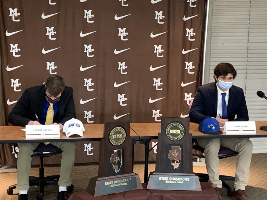 Connor Gaynor, left, and Thomas Egan, right, on signing day at Mount Carmel, October 11.