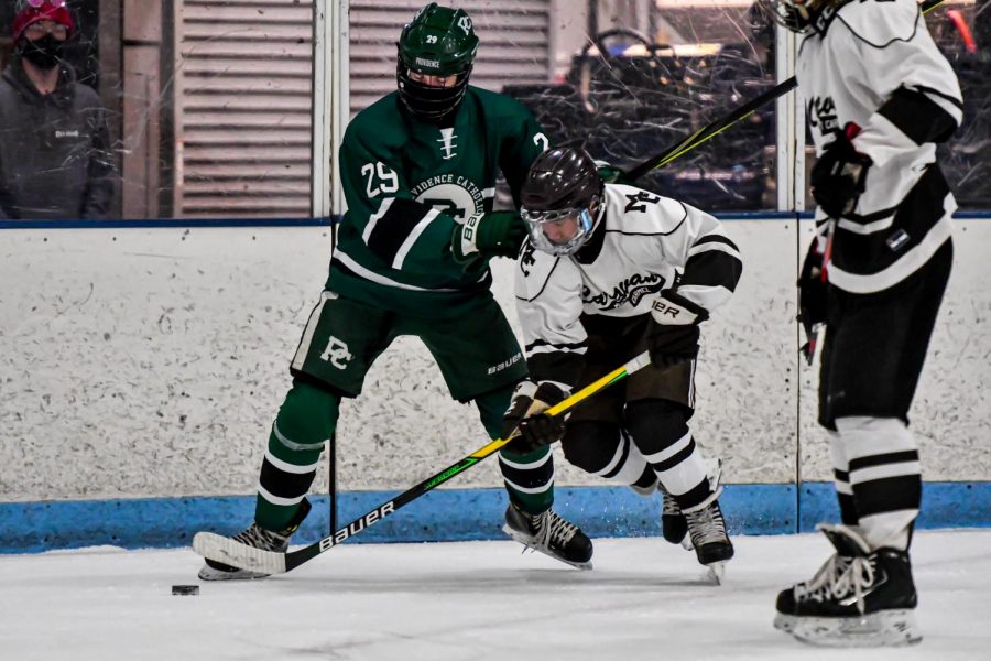 Mount Carmel Hockey Team in a game against Providence This season