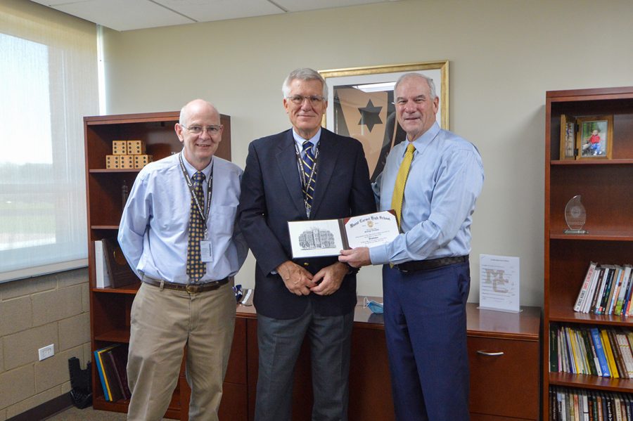 Upon his retirement from his volunteer role, George Vrechek (pictured with Journalism teacher John Haggerty and President Ned Hughes) was named an Honorary Alumnus of Mount Carmel High School.