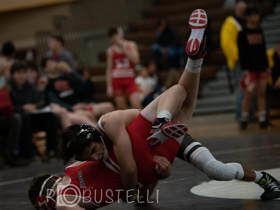 Noel Rosales '21 shown wrestling against Marist in the 2019-2020 season, look forward to the abbreviated spring season this year.