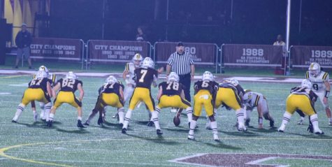 The Mount Carmel offense lines up against St. Laurence on October 8th.