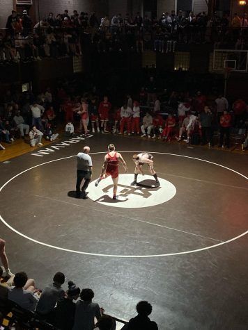 Wrestlers set to square off in a recent match at Mt. Carmel High School.