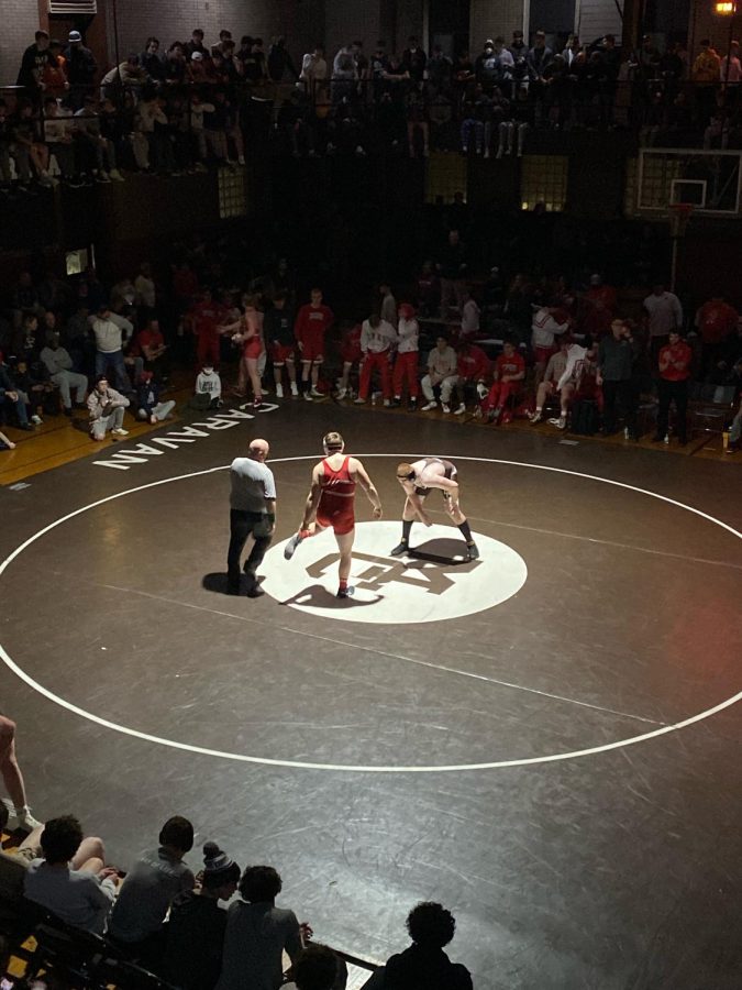 Wrestlers+set+to+square+off+in+a+recent+match+at+Mt.+Carmel+High+School.