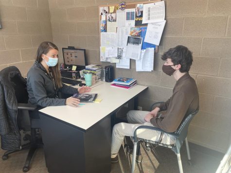 College and Career Counselor Mrs. Kristina Luster Meeting with Senior Joe Baranowski about college plans. 