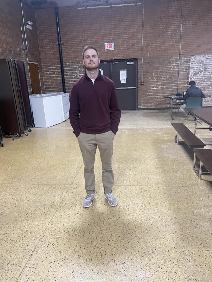 Coach Trey standing in the Mount Carmel student center on March 3