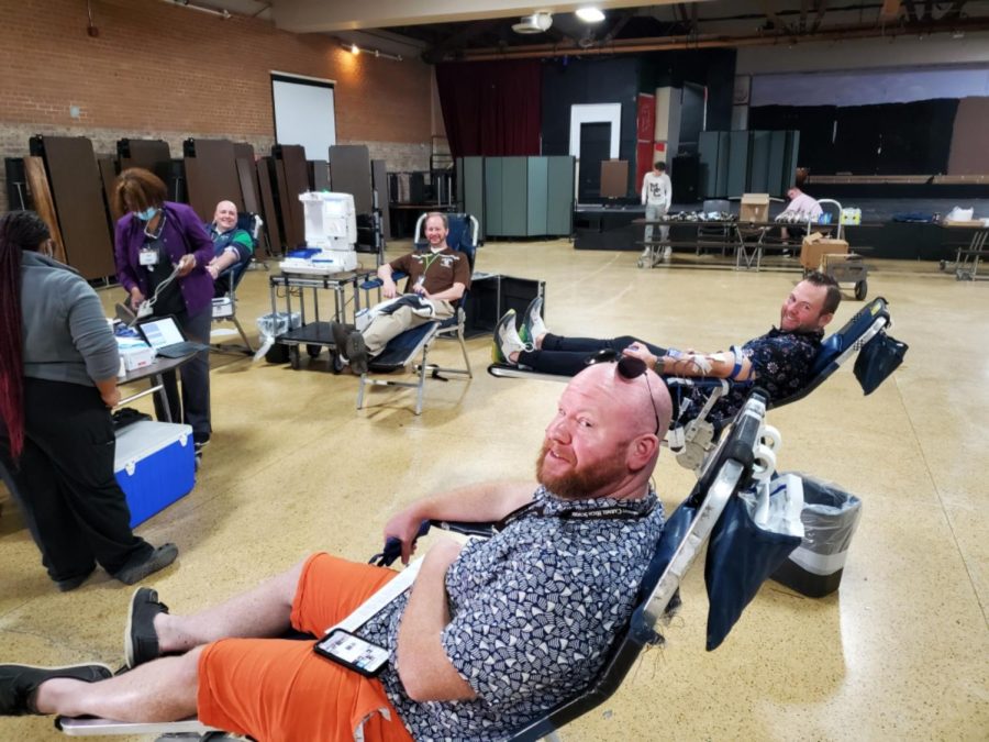 (from left) Mr. Peltzer, Mr. Stimler, Mr. Baffoe, and Mr. Tabernacki relax while donating at the 2022 MC Blood Drive.