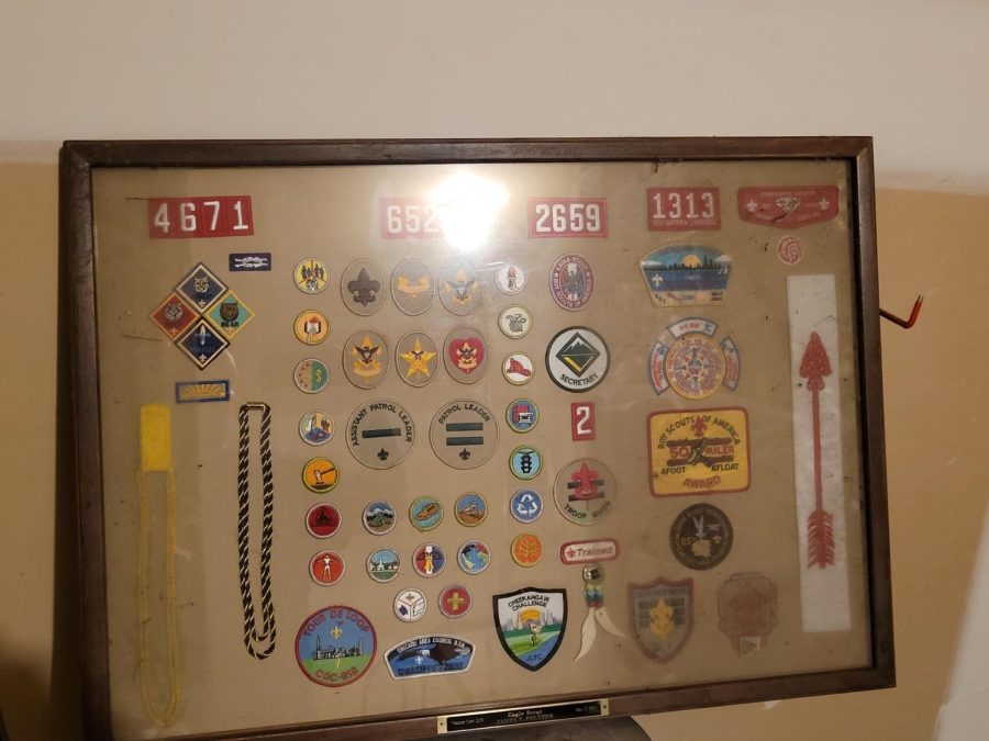 This+framed+board+of+Mr.+Peltzers+is+an+example+of+commendations+and+badges+earned+by+someone+who+has+worked+their+way+to+Eagle+Scout+status.