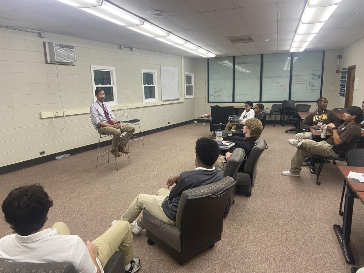 Cross Country coach and theology teacher Mr. Daniel Burke 98 was one of the guest speakers for a meeting T.H.E. Club had during the first trimester. 
