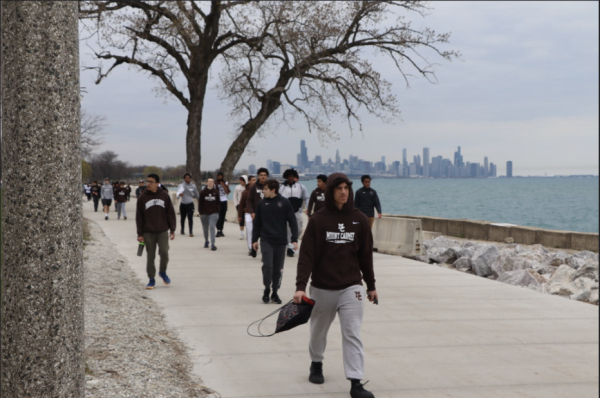 The Caravan students do their walk along the Lakefront in 2023.  
