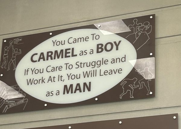 The legendary sign in Mount Carmel's cafeteria reminds students that success comes with struggles and hard work.