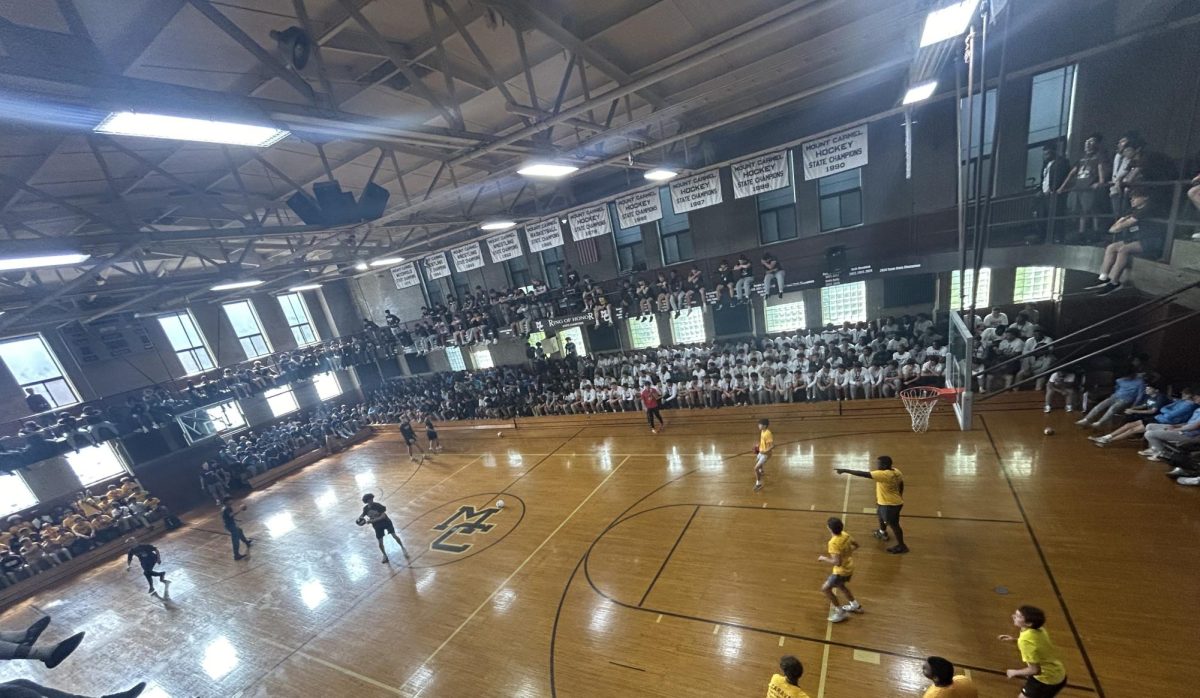 During "class color" theme day, seniors squared off against the freshmen in dodgeball in Alumni Gym.