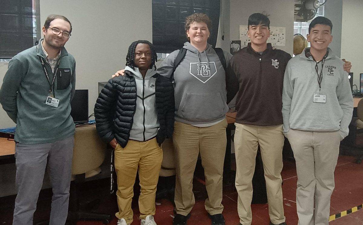 (From left) Mr. Dominic Scheuring and team captains Angel Tate, Aiden McGovern, Aiden Correa, and Angelo Correa have an overall sense of pride in their performance during the fall season.