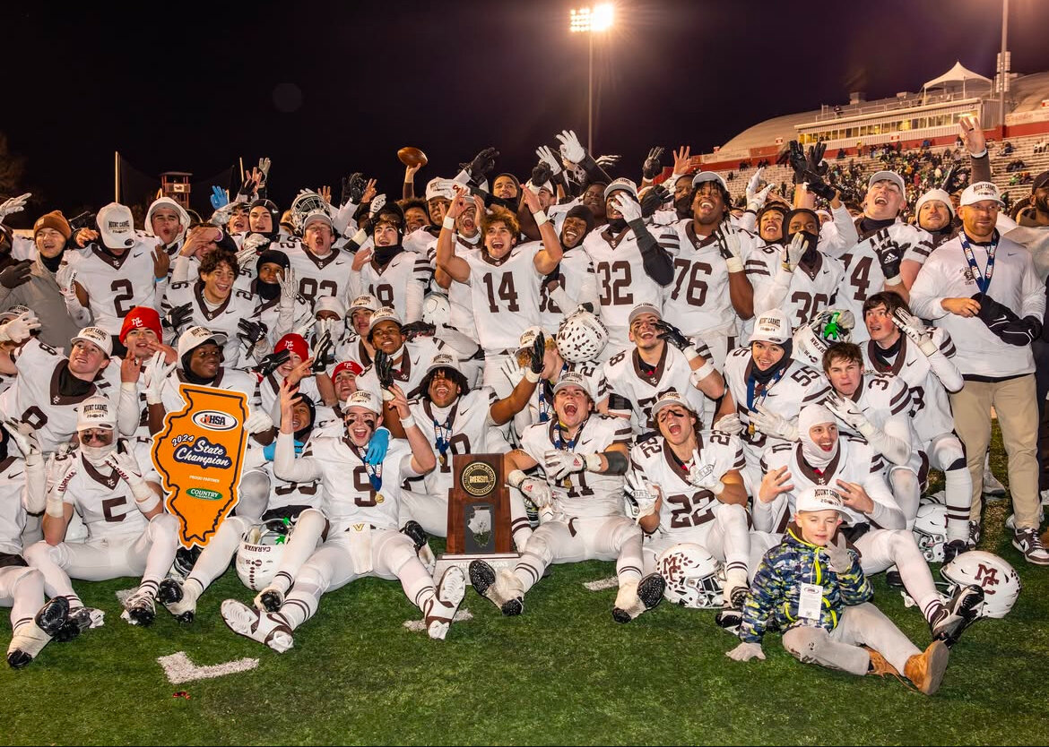 The Caravan celebrated after defeating Batavia 55-34 in dominating fashion at Hancock Stadium on November 30m 2024. 
