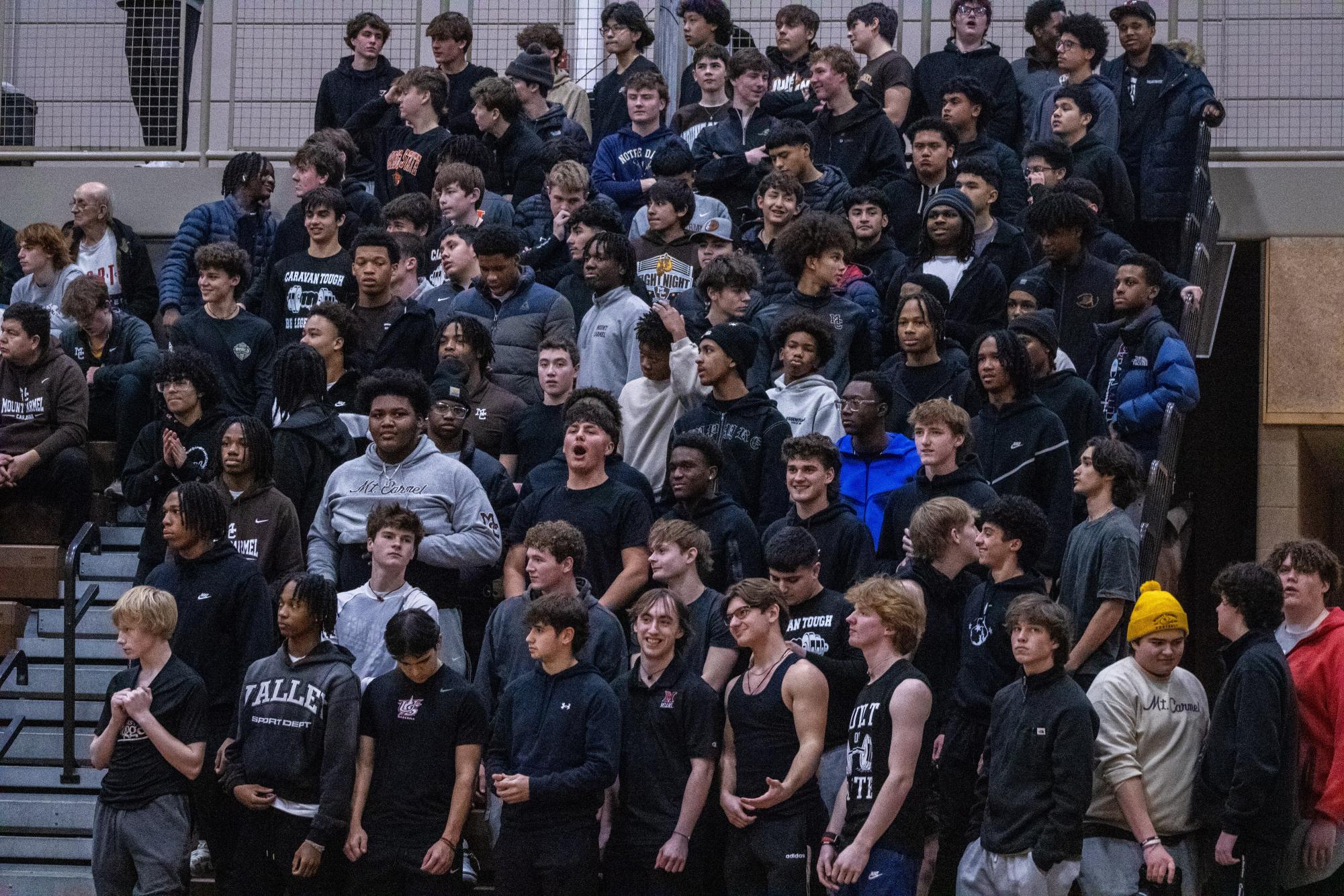 Mount Carmel’s student section patiently awaits tip-off for the highly anticipated matchup between the Caravan and the Rams from DePaul College Prep on January 17, 2025.