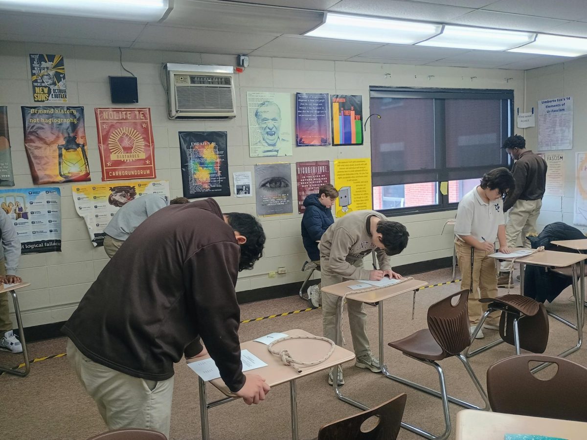 MC sailors work on identifying different types of knots, as well as various parts of the ship during an after-school classroom session on February 19, 2025.