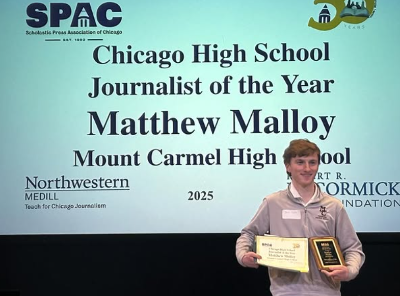 Malloy stands proudly with his award and scholarship at the Scholistic Press Association of Chicago's annual conference at Northwestern University on March 14, 2025. 
