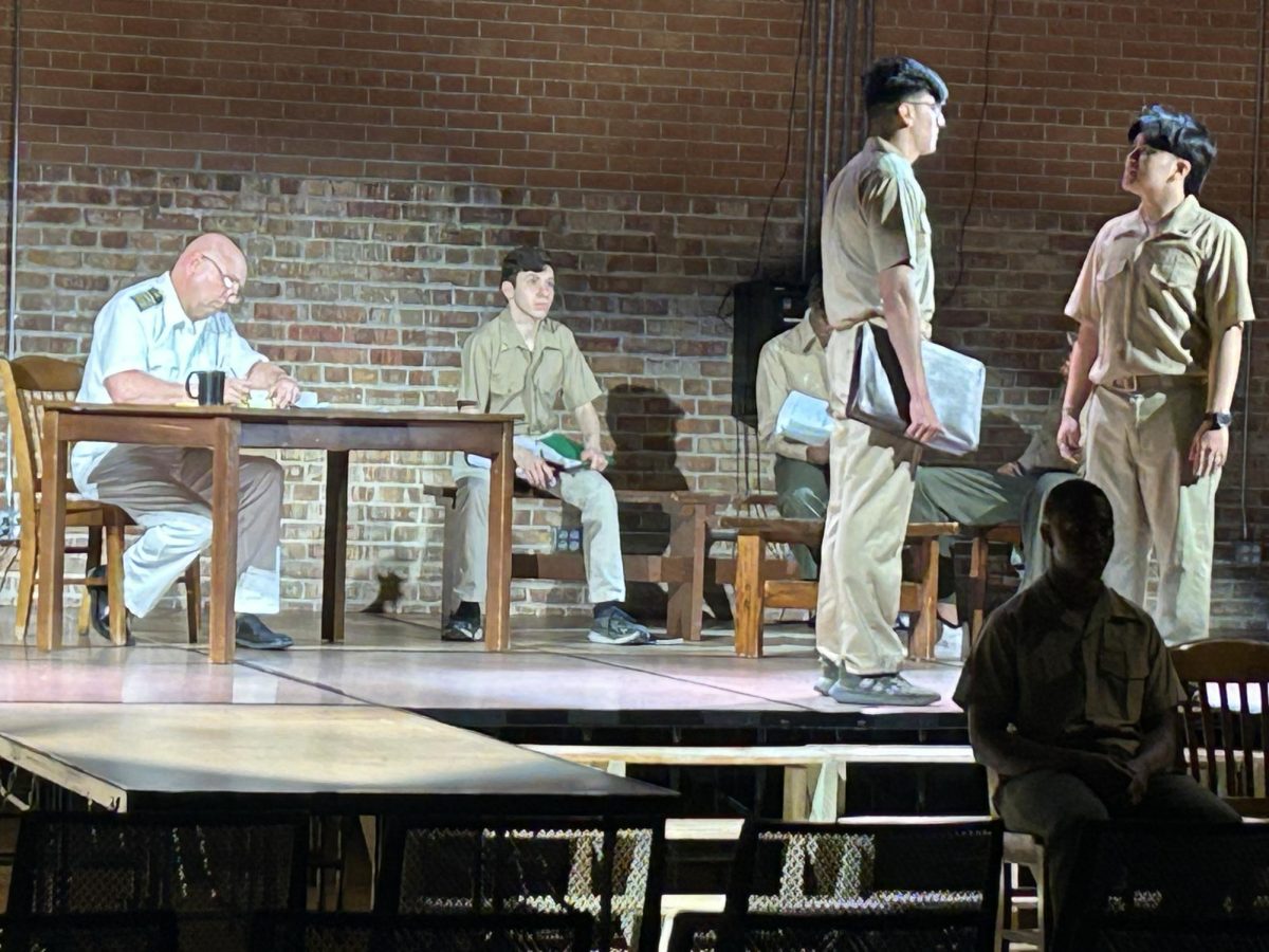 The cast of MC's production of A Few Good Men rehearses on April 29 in the Barry-Hughes Performing Arts Center.