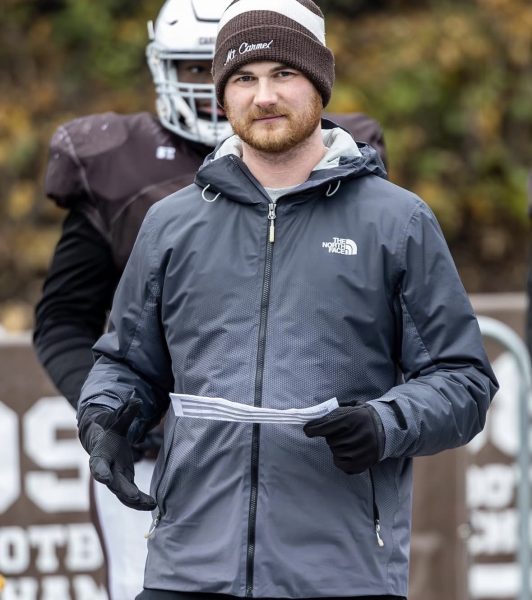 Coach Trey Ross has coached on the varsity football staff for 5 years and is in his first year teaching physical education at MC.