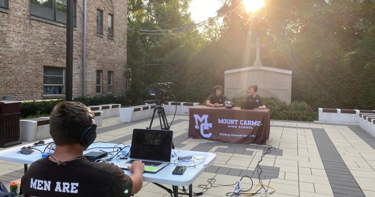 Members of the Caravan Media Group create a pre-game show for one of their football broadcasts.