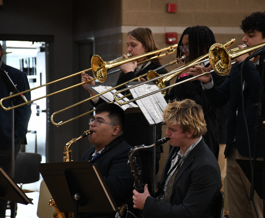 Mount Carmel jazz band members perform during a school Mass in the main gym on Monday, December 8, 2025, 