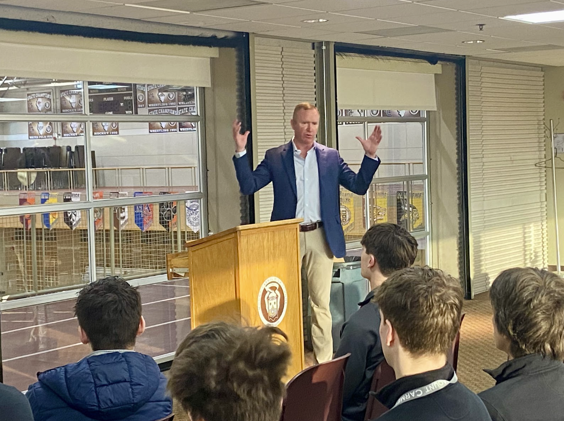 Mr. Jack Molloy ’90 talks to the Business Club on March 4, 2026.