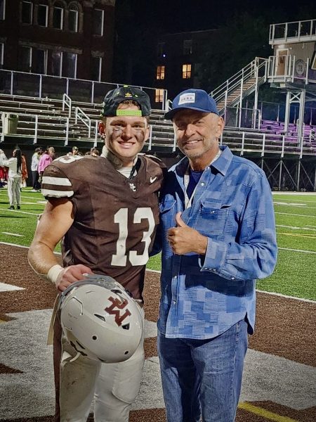 Dean Kemph (left) with his grandfather following a 2025 MC football game.
